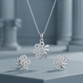 Pinwheel 925 sterling silver pendant and stud earrings jewellery set with cubic zirconia by Silvme â€” lifestyle gift image