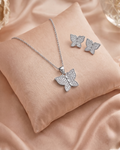 Butterfly 925 sterling silver pendant and stud earrings jewellery set with cubic zirconia by Silvme â€” gift styling view
