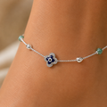 Silvme clover evil eye & green stone 925 silver anklet with green stones and a clover evil-eye motif, full-length view