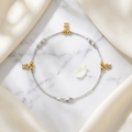 Styled view of the Silvme gold CZ charm 925 sterling silver anklet for women