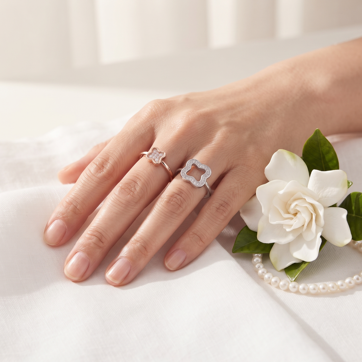 Silvme Flower Stack with cubic zirconia 925 sterling silver floral ring for women, two-tone rose gold and silver, cz ring for women, white stone ring, close-up design detail