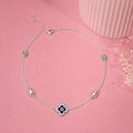Charm, bead and chain detail on the Silvme clover evil eye & green stone 925 silver anklet payal