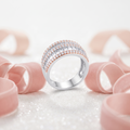 Silvme triple row CZ statement silver ring for women worn layered with slim silver stacking rings on the hand