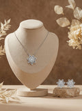 Silvme 925 silver floral flower pendant necklace and stud earrings with cubic zirconia, side profile view