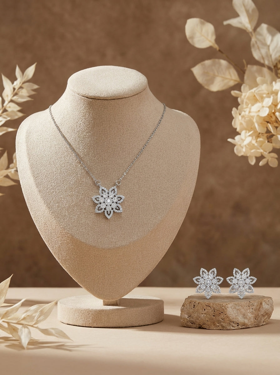 Silvme 925 silver floral flower pendant necklace and stud earrings with cubic zirconia, side profile view