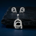 Silvme 925 silver minimalist arch pendant and stud earrings, close-up detail