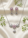 Silvme pure 925 sterling silver geometric pink pendant necklace and stud earrings set with pink cubic zirconia, front view of the complete set