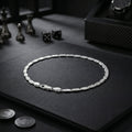 Link pattern and surface detail across the flat mariner link bracelet by Silvme