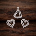 Silvme pure 925 sterling silver baguette heart pendant and stud earrings set with cubic zirconia, styled flatlay view