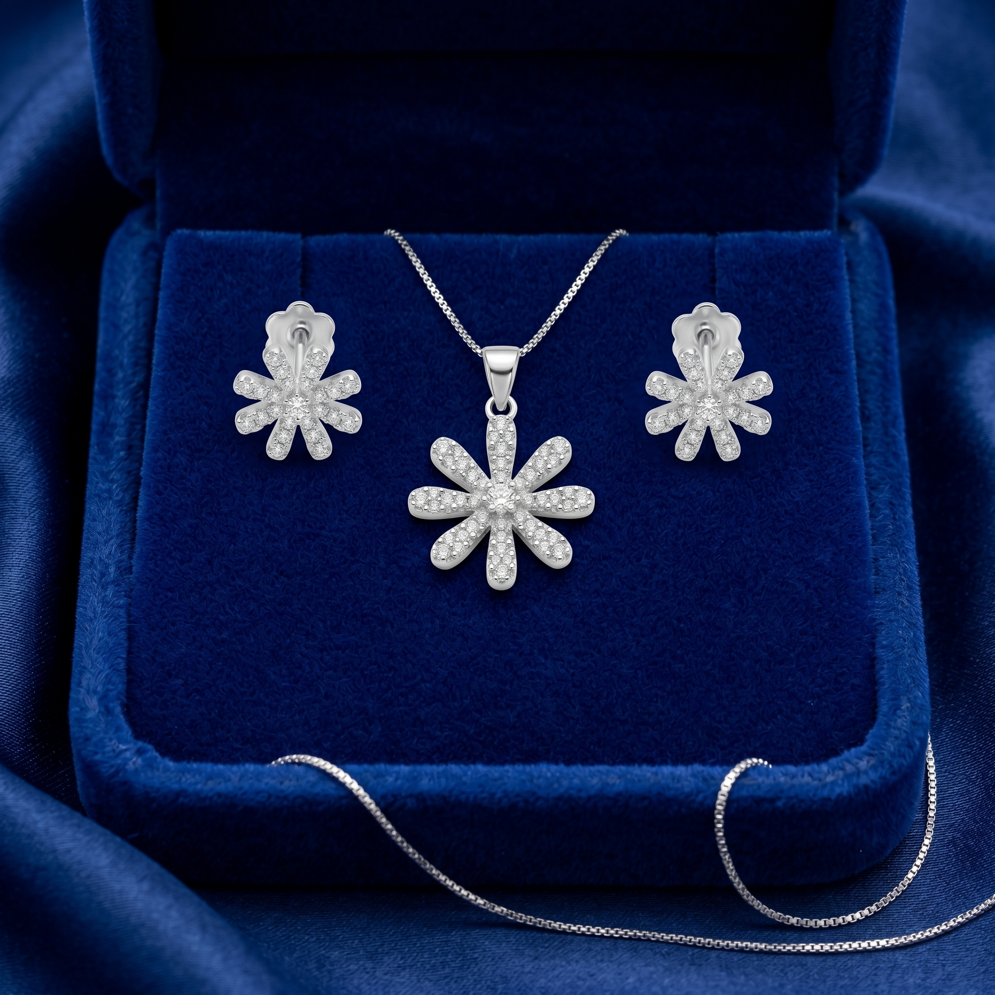 Floral Flower 925 sterling silver pendant and stud earrings jewellery set with cubic zirconia by Silvme â€” styled setting image
