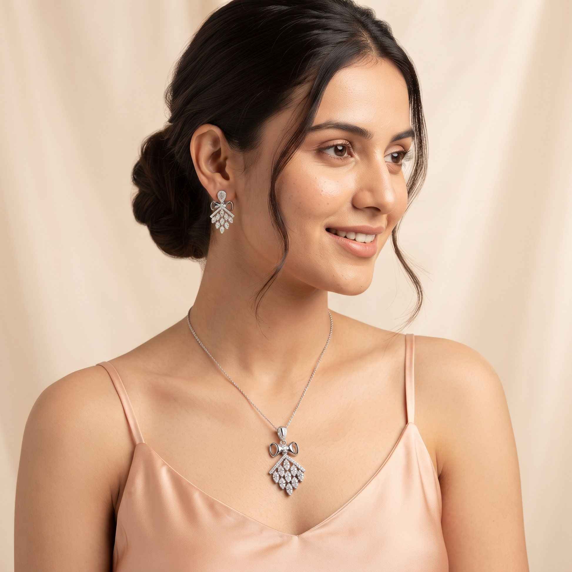 Silvme pure 925 sterling silver kite cluster pendant necklace and drop earrings set with cubic zirconia, styled flatlay view