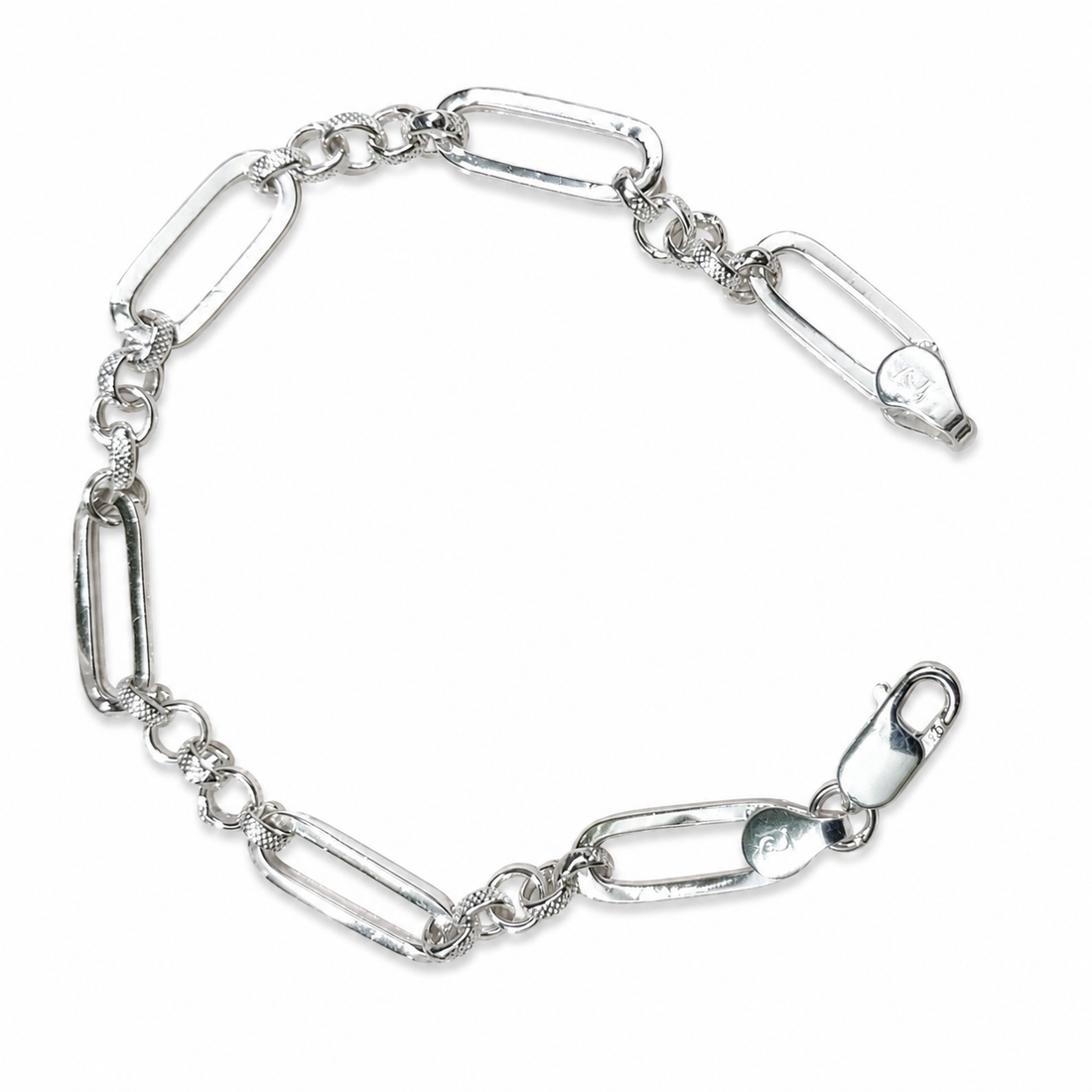 Silvme 925 sterling silver paperclip and round link bracelet for men shaped into an oval on a white background