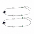 Styled view of the Silvme clover evil eye & green stone 925 sterling silver anklet for women