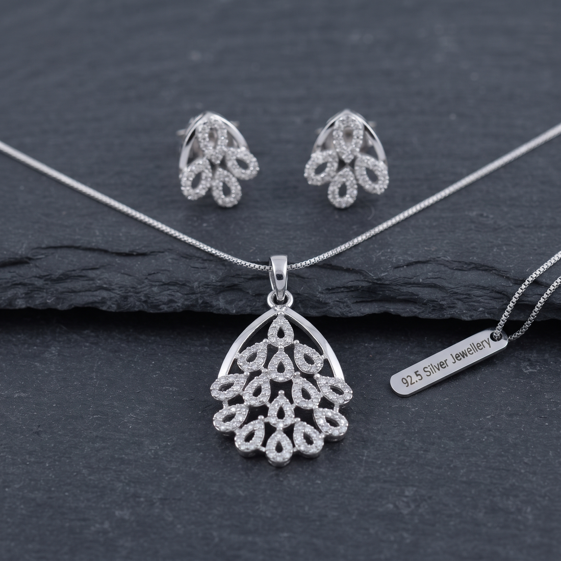 Silvme 925 silver sparkling cubic zirconia pendant and stud earrings with cubic zirconia, model styling view