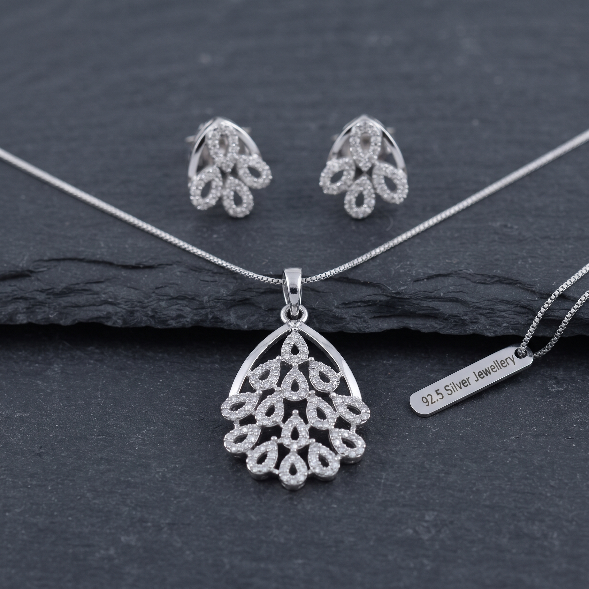 Silvme pure 925 sterling silver sparkling cubic zirconia pendant and stud earrings set with cubic zirconia, styled product image