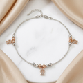 Styled view of the Silvme rose-gold CZ bell charm 925 sterling silver anklet for women