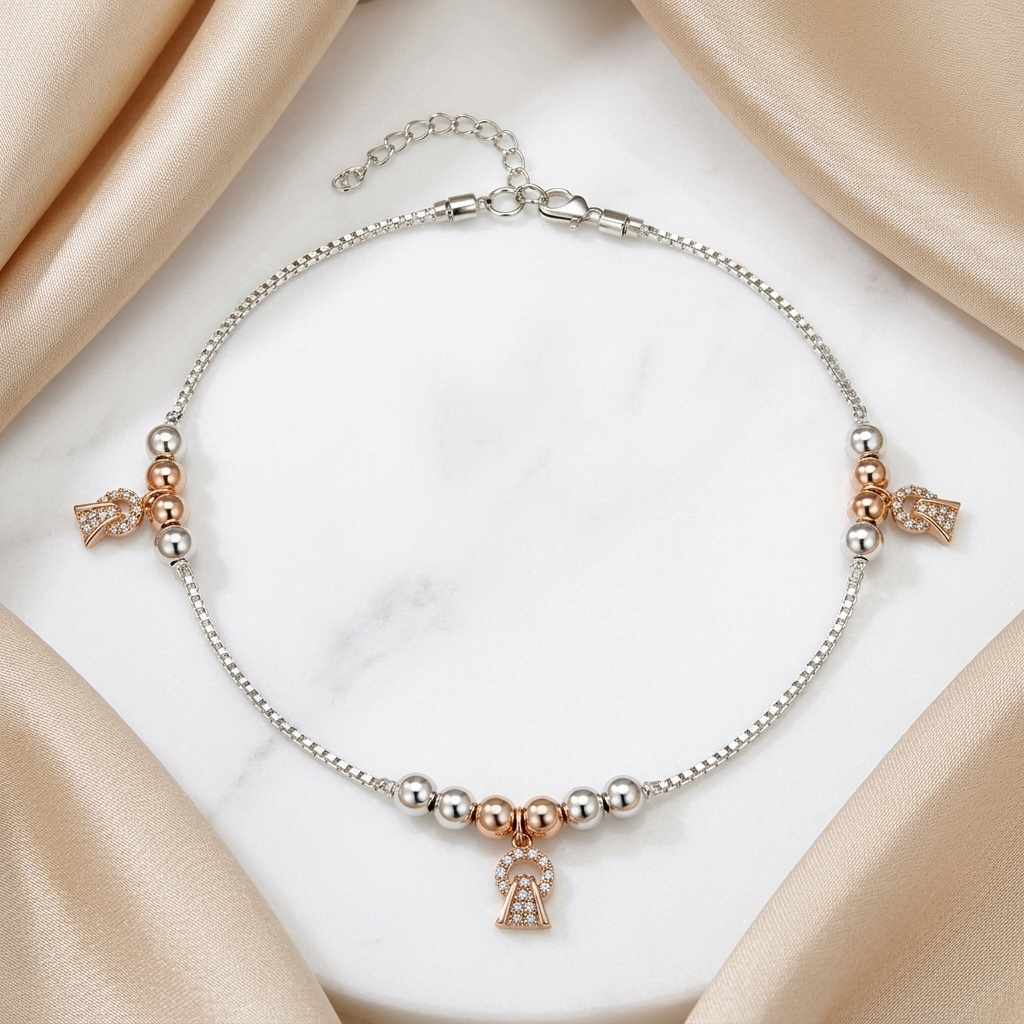 Styled view of the Silvme rose-gold CZ bell charm 925 sterling silver anklet for women