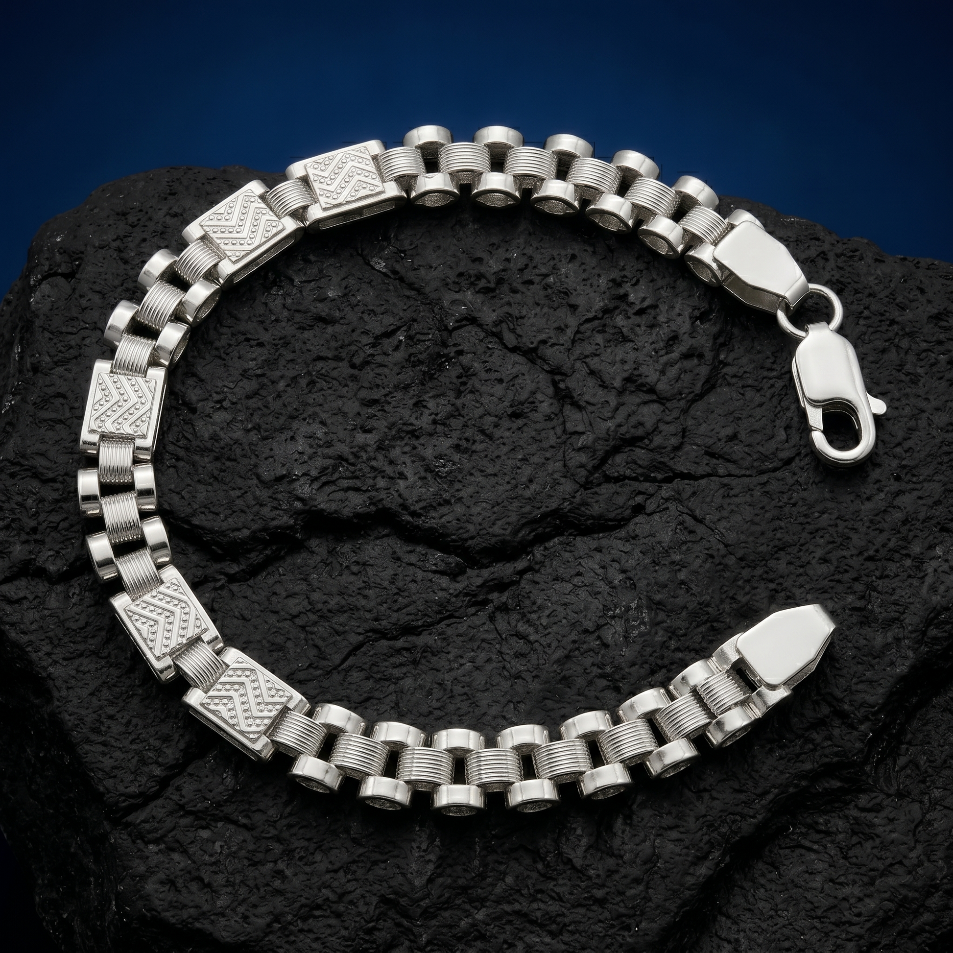 The panel link bracelet for men shown against a plain studio background