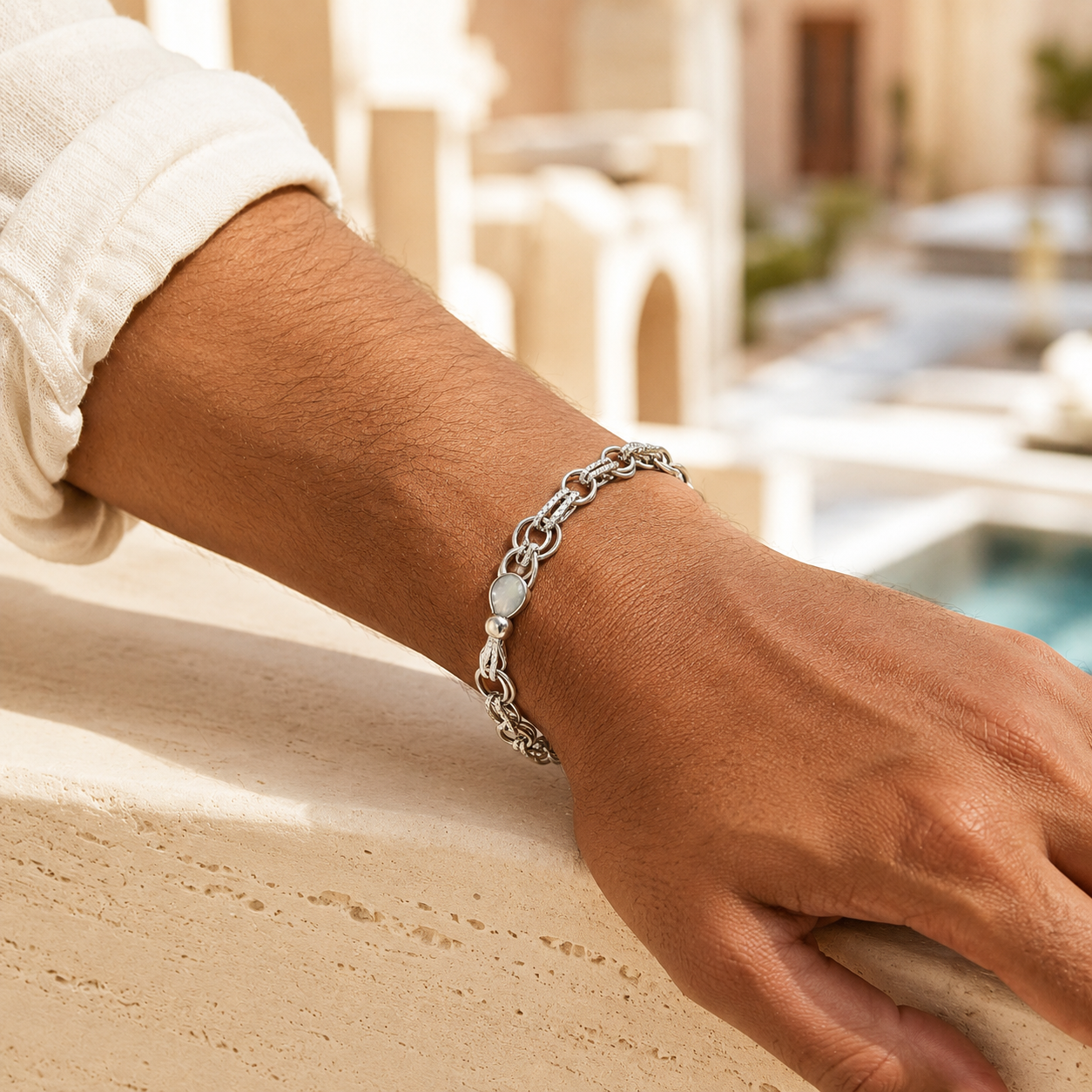 Full length of the fine rolo chain bracelet showing its polished silver-tone finish