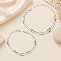 Close-up of delicate silver station beads in a minimalist chain on the Silvme 925 sterling silver minimal beaded chain anklet