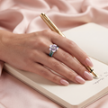 Silvme purple floral silver ring for women worn stacked with plain silver bands on the hand
