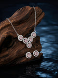 Silvme pure 925 sterling silver pink cluster pendant necklace and stud earrings set with pink cubic zirconia, matching earrings close-up