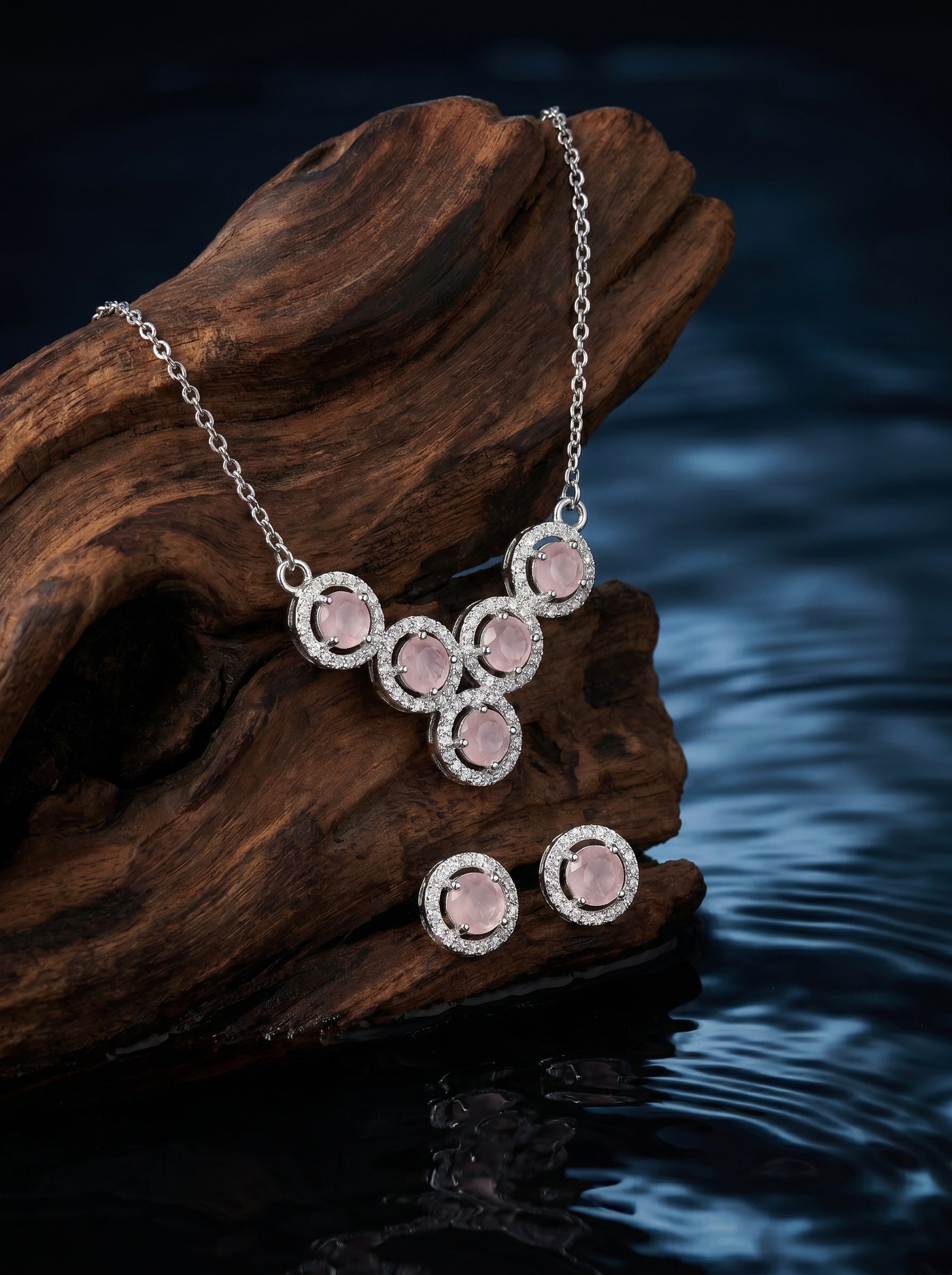 Silvme pure 925 sterling silver pink cluster pendant necklace and stud earrings set with pink cubic zirconia, matching earrings close-up