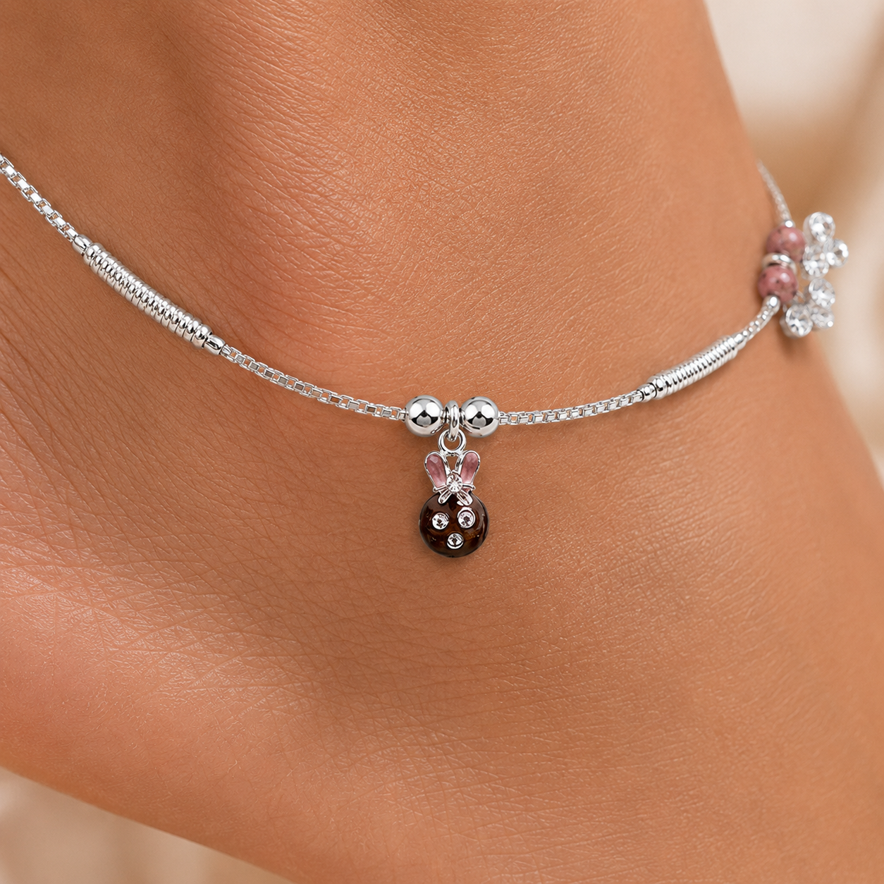 Clasp and adjustable extension-chain detail of the Silvme pink bead & rose-gold floral silver anklet
