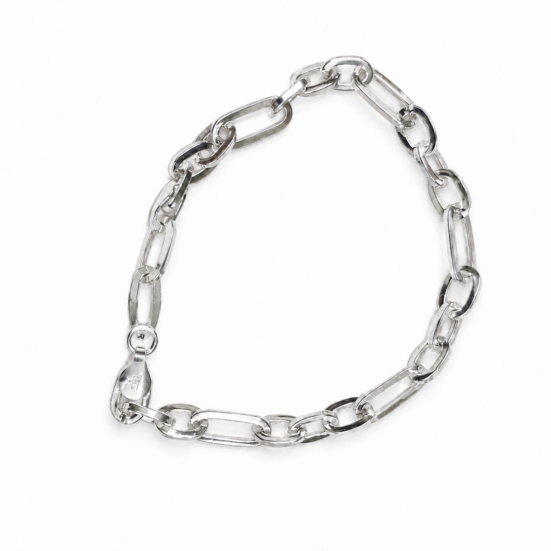 Silvme 925 sterling silver elongated figaro bracelet for men shaped into an oval on a white background