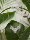 Silvme pure 925 sterling silver pink cluster pendant necklace and stud earrings set with pink cubic zirconia, detail sparkle close-up