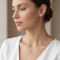 Silvme pure 925 sterling silver infinity pendant and stud earrings set with cubic zirconia, styled lifestyle image