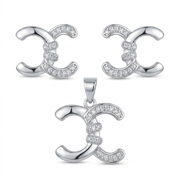 Silvme 925 sterling silver interlocking crescent pendant and stud earrings in pave cubic zirconia, white background