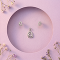 Minimalist Arch 925 sterling silver pendant and stud earrings jewellery set by Silvme â€” styled product image