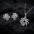 Silvme pure 925 sterling silver pinwheel pendant and stud earrings set with cubic zirconia, styled setting image