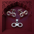 Silvme 925 silver ribbon bow pendant and stud earrings with cubic zirconia, matching earrings close-up
