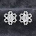 Snowflake Flower 925 silver stud earrings for women, everyday wear, editorial styling shot