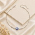 Silvme single evil eye 925 silver anklet with a single blue evil-eye bead, full-length view