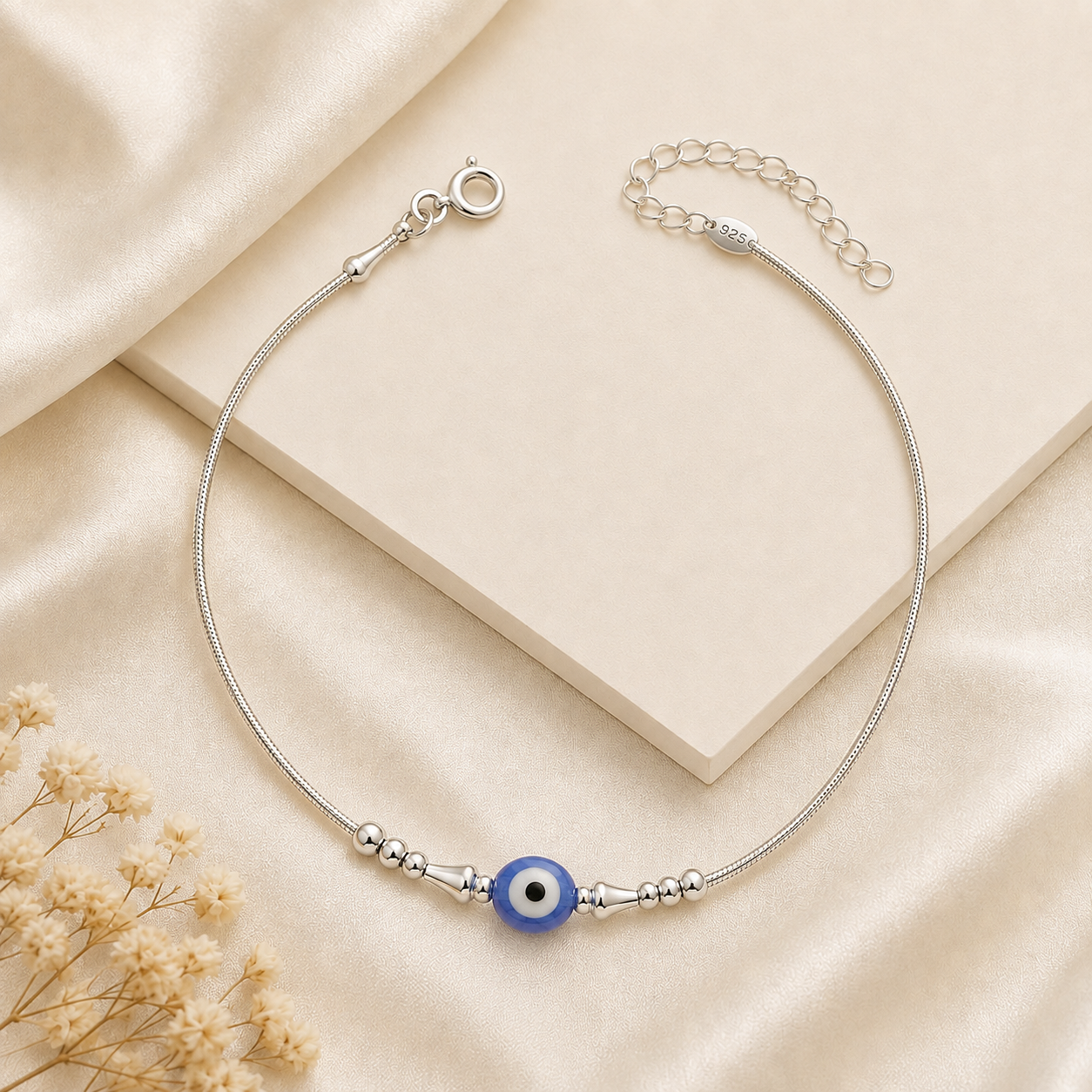 Silvme single evil eye 925 silver anklet with a single blue evil-eye bead, full-length view