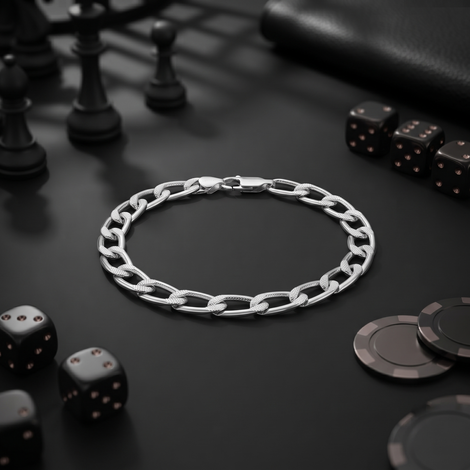 The curb chain bracelet for men shown against a plain studio background