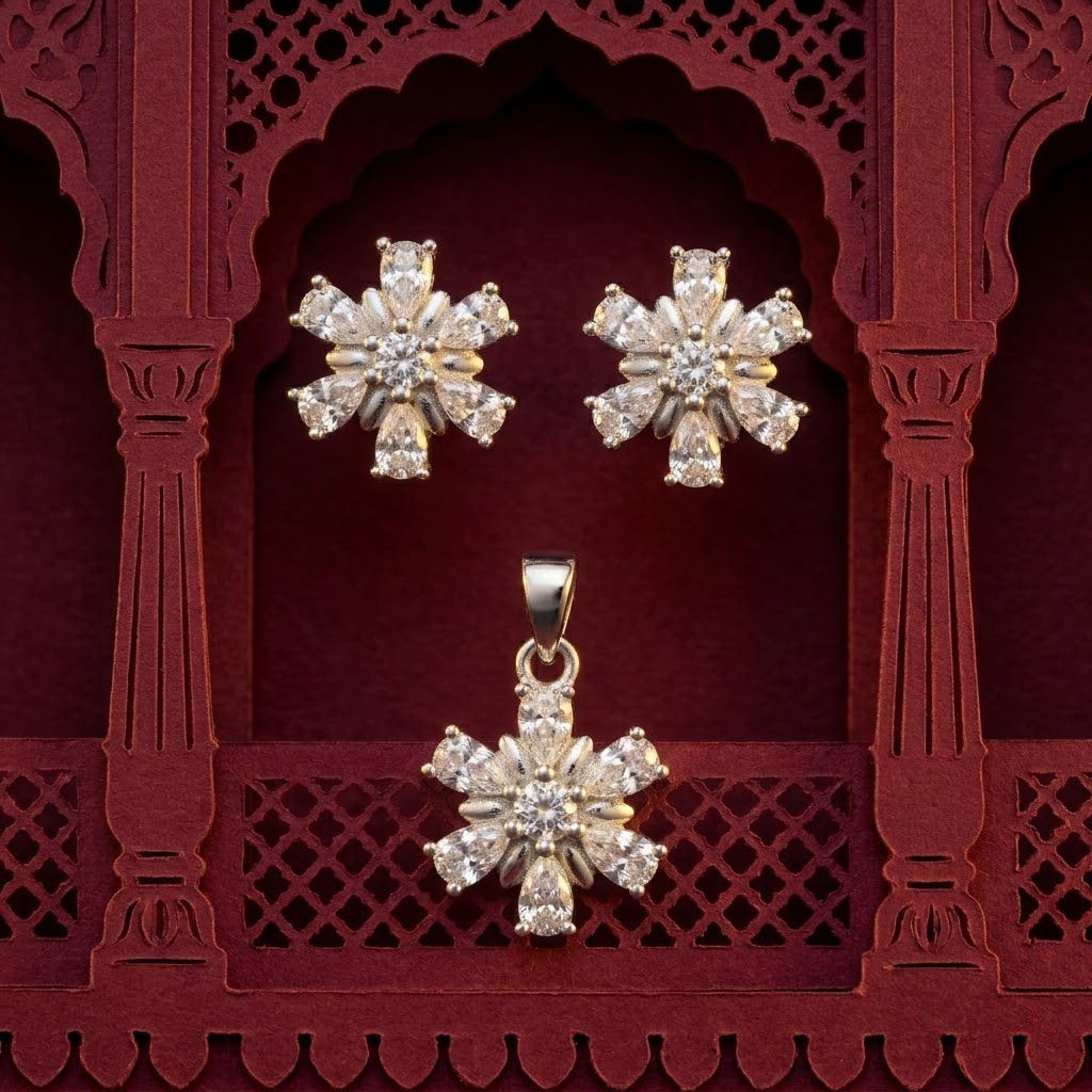 Snowflake 925 sterling silver pendant and stud earrings jewellery set with cubic zirconia by Silvme â€” angled studio view