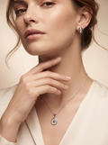 Silvme pure 925 sterling silver teardrop pendant and drop earrings set with cubic zirconia, styled lifestyle image