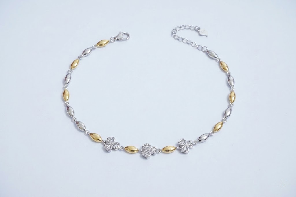925 sterling silver Two-Tone Floral CZ Bracelet by Silvme accented with sparkling cubic zirconia, gold-tone finish, an elegant accessory for her