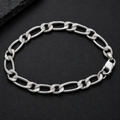End links and fastening detail on the Silvme faceted figaro chain bracelet