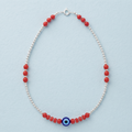 Silvme red bead evil eye 925 silver anklet with red beads and a blue evil-eye charm, full-length view