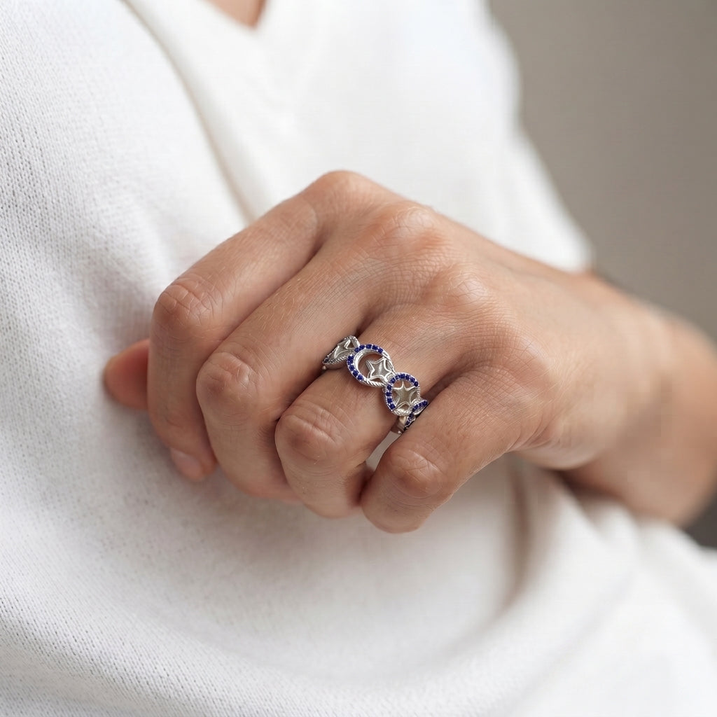 Silvme blue stone link silver ring for women worn stacked with plain silver bands on the hand
