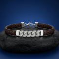 Lobster clasp and end links on the Silvme braided cord bracelet with pave bar