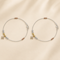 Close-up of a dainty square CZ charm on a fine chain on the Silvme 925 sterling silver delicate square CZ charm anklet