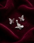 Silvme pure 925 sterling silver pink butterfly pendant and stud earrings set with pink cubic zirconia, side profile view