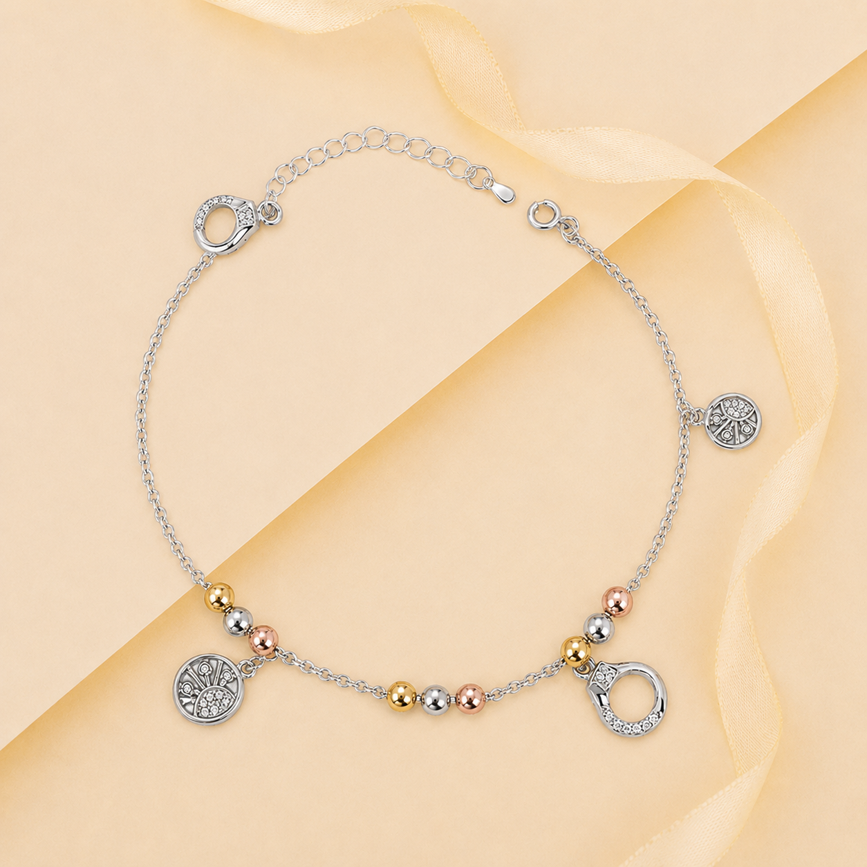 Charm, bead and chain detail on the Silvme tree of life tri-tone charm 925 silver anklet payal