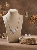 Silvme 925 silver pink cluster pendant necklace and stud earrings with pink cubic zirconia, side profile view